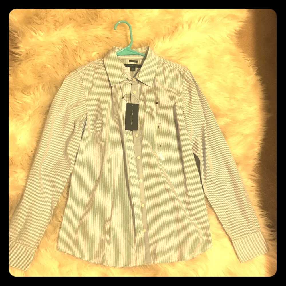 A Tommy Hilfiger Women’s button down shirt. Size s